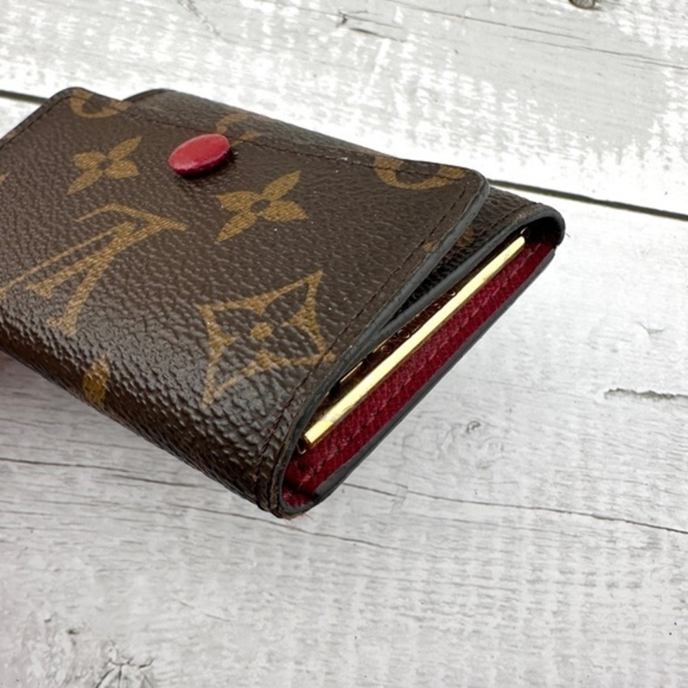 AUTHENTIC Louis Vuitton key holder. Monogram pattern. Magenta interior. - Picture 7 of 15